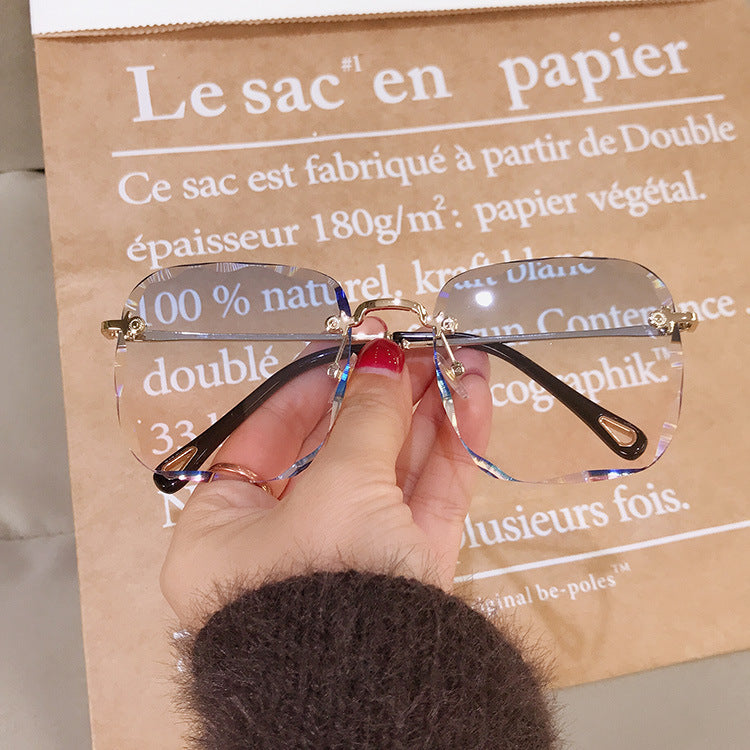 Square frameless sunglasses with polygonal lenses by My Store 3, showcasing modern, trendy eyewear style.