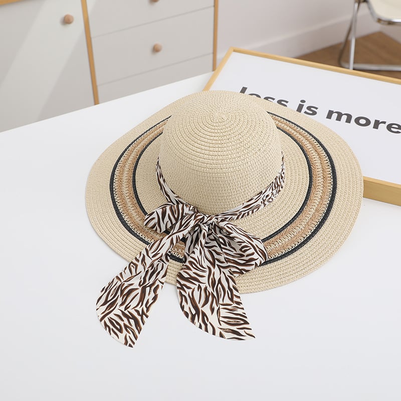 Stylish women's foldable beach hat by My Store 3, featuring wide brim and lightweight design for sun protection and fashion.