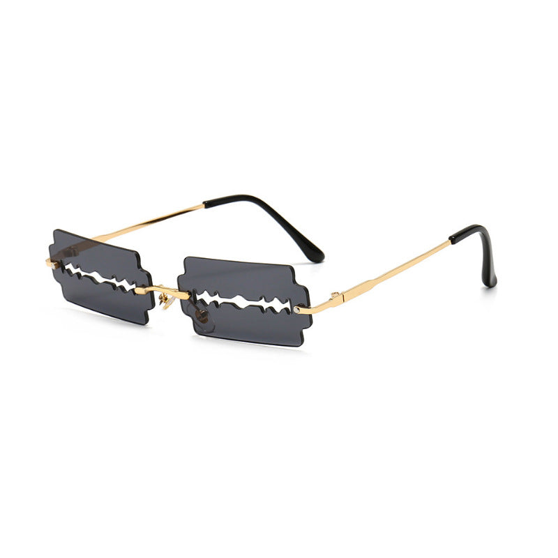 Trendy hollow blade style sunglasses by My Store 3 with sleek black frames and modern design, perfect for fashionistas.