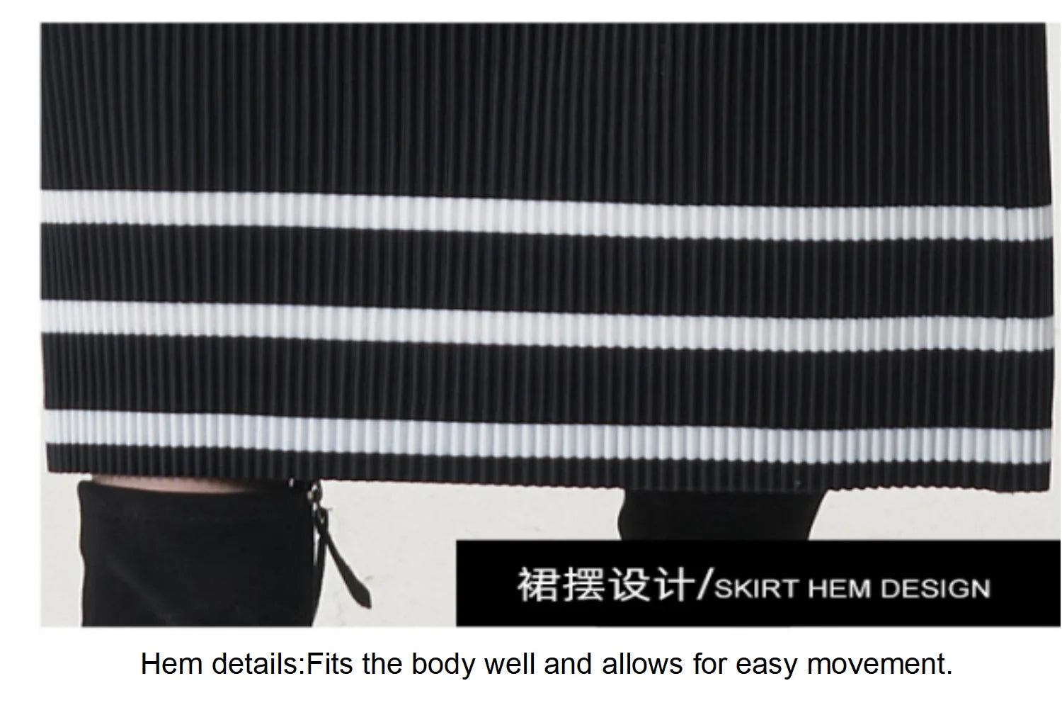 A trending women's clothing item for 2026: a matching black batwing-sleeved striped T-shirt and straight-cut skirt set by Miyake