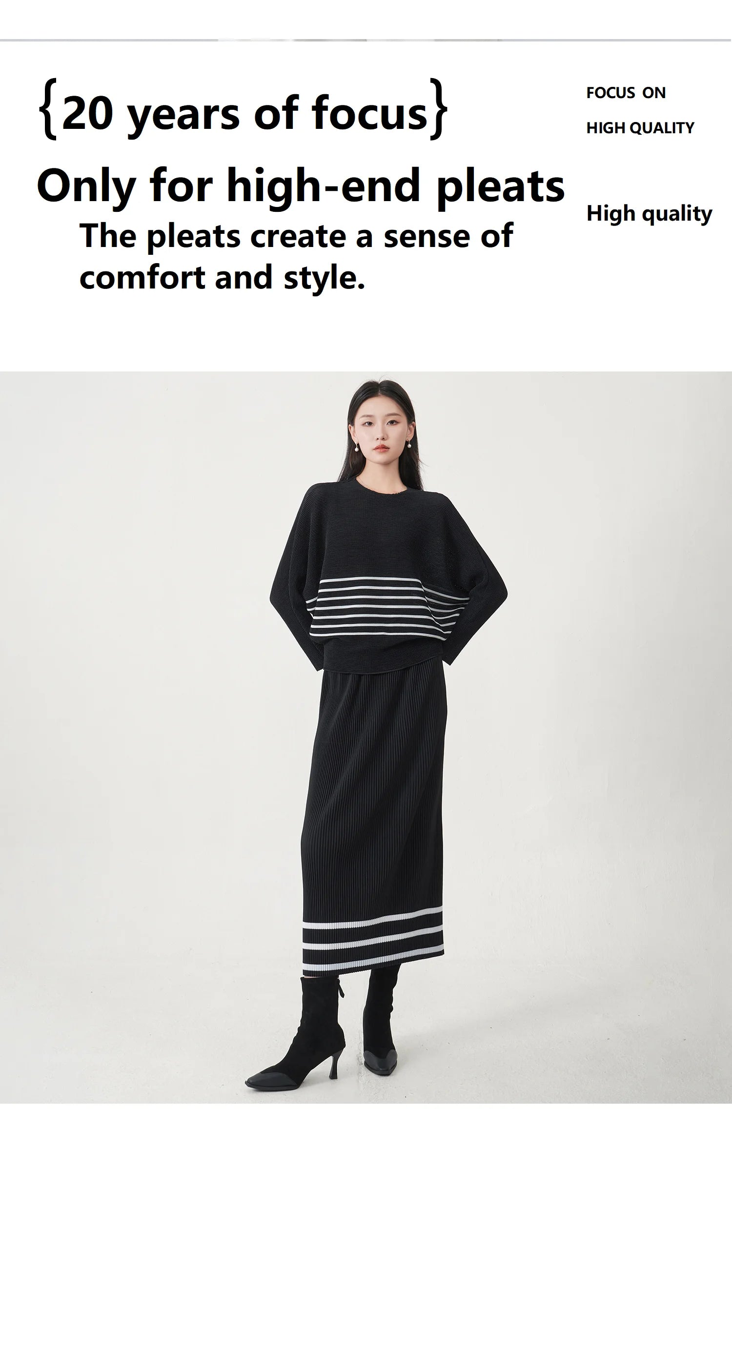A trending women's clothing item for 2026: a matching black batwing-sleeved striped T-shirt and straight-cut skirt set by Miyake