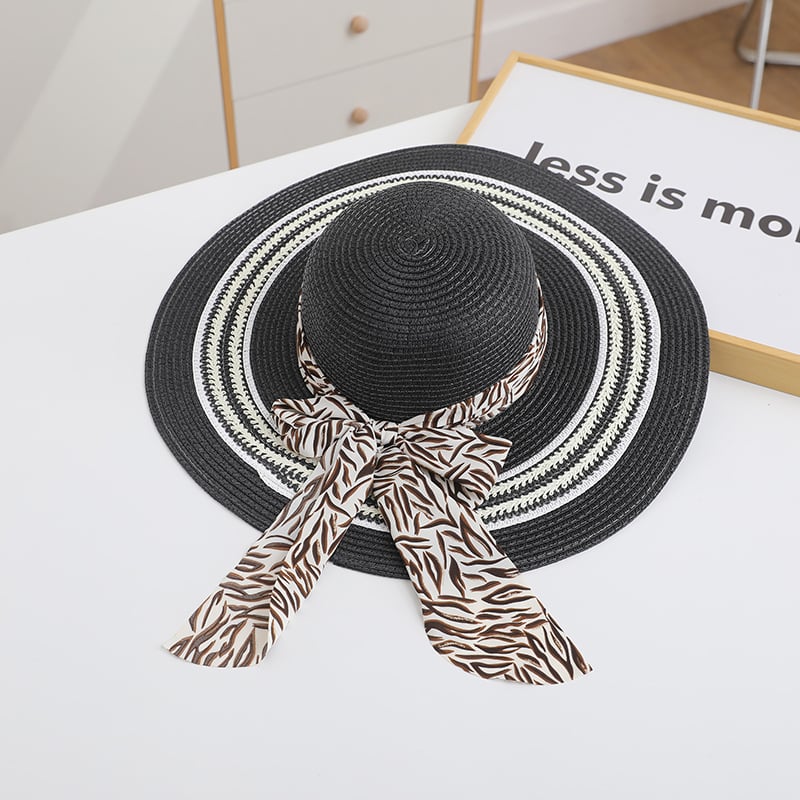 Stylish women's foldable beach hat by My Store 3, featuring wide brim and lightweight design for trendy seaside looks.