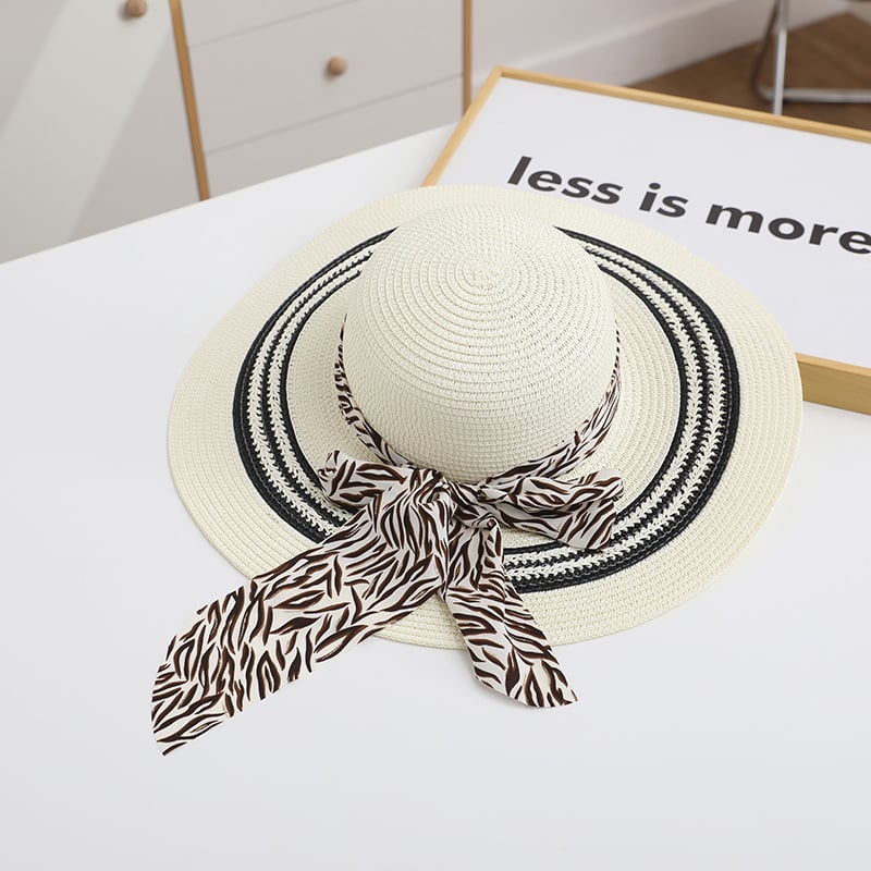 Women's foldable beach hat by My Store 3 with wide brim and stylish design, perfect for sunny outdoor beach outings.