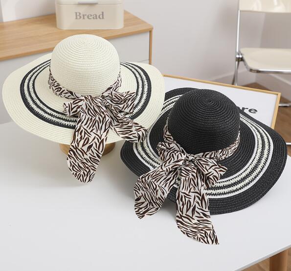 Stylish women's foldable beach hat by My Store 3 with wide brim and breathable fabric, perfect for sunny seaside outings.