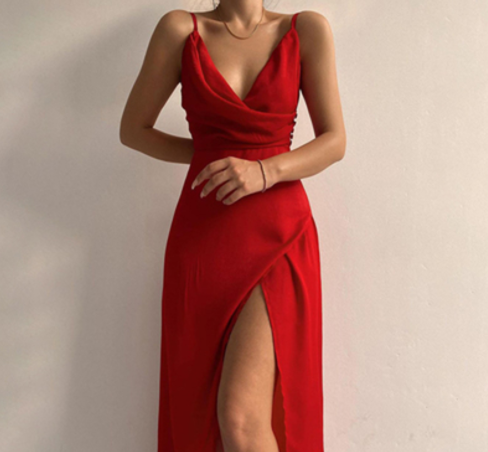 V-neck slip dress with low cut and side slit from My Store 3, shown in a sleek, stylish design on a model.